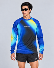 Front studio view of a male model wearing the Entering Flow State long-sleeve TempoTech running tee with black Phanto-3 race shorts