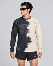 Front studio view of a male model wearing the charcoal and cream Half Dye long-sleeve TempoTech running tee with black Phanto-3 race shorts