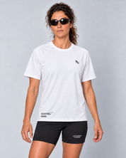 Front studio view of a female model wearing the white Three Ways short-sleeve TempoTech running tee and black Shift-5 shorts