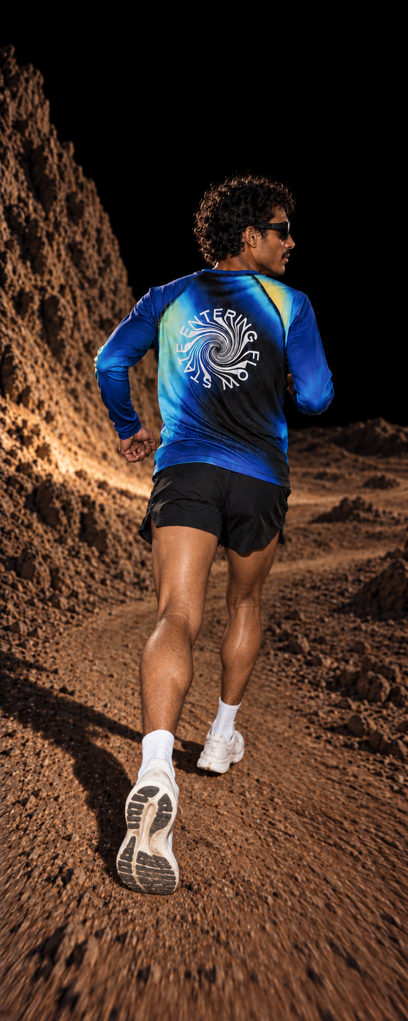 Out of this World campaign: runner on a rocky trail wearing Entering Flow State