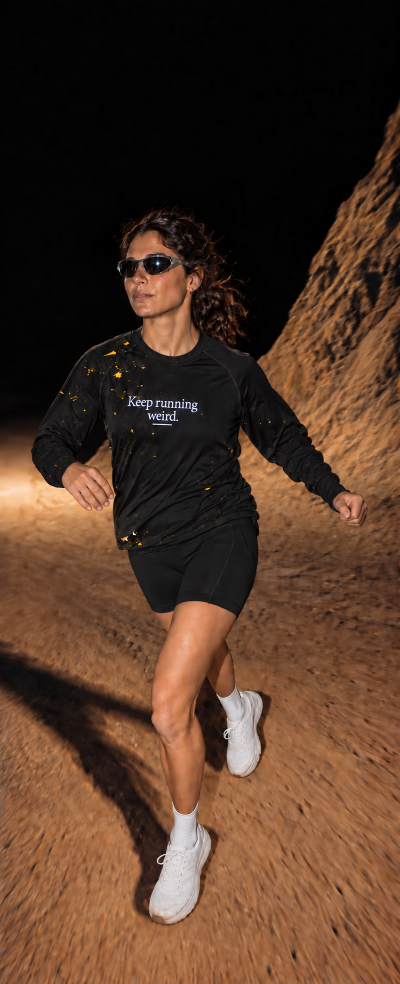 Out of this World campaign: runner on a rocky trail wearing Keep running weird